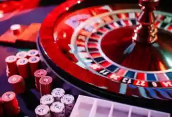 Casino game selection screen showing slots and table games on a mobile device